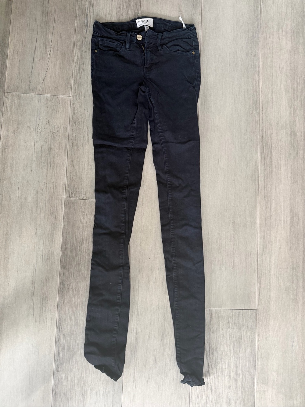 Frame Denim Skinny Jeans in Black